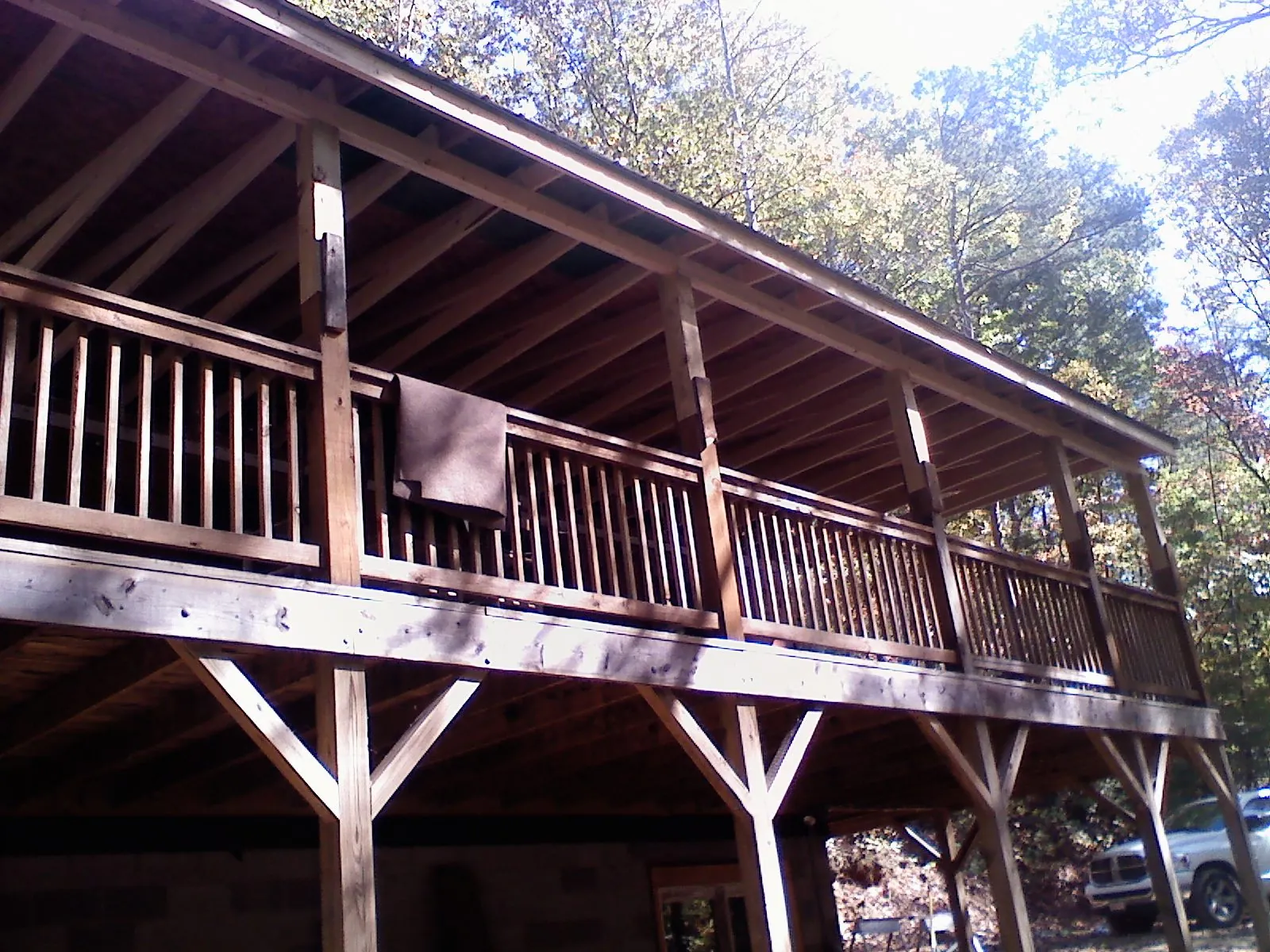Timber framing under a new elevated porch and deck — Roof Leak Repair in East Wareham by Roofing Brothers